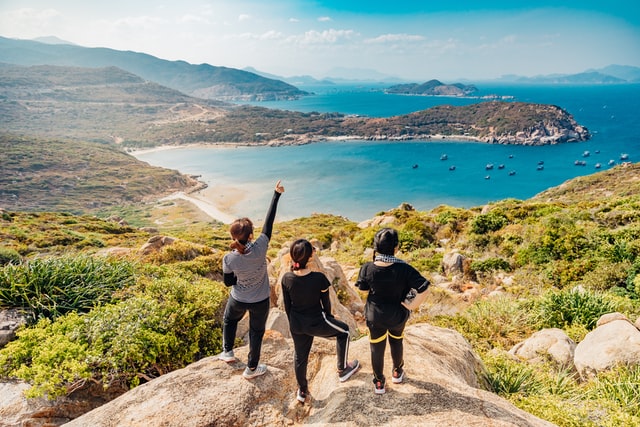 A group of three women entrepreneurs are on vacation.