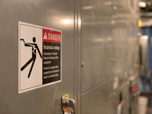 A high voltage danger sign to keep employees away from dangers in the workplace. 
