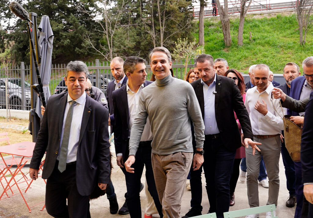 Greek Prime Minister is about to enter JOIST Innovation Park followed by people